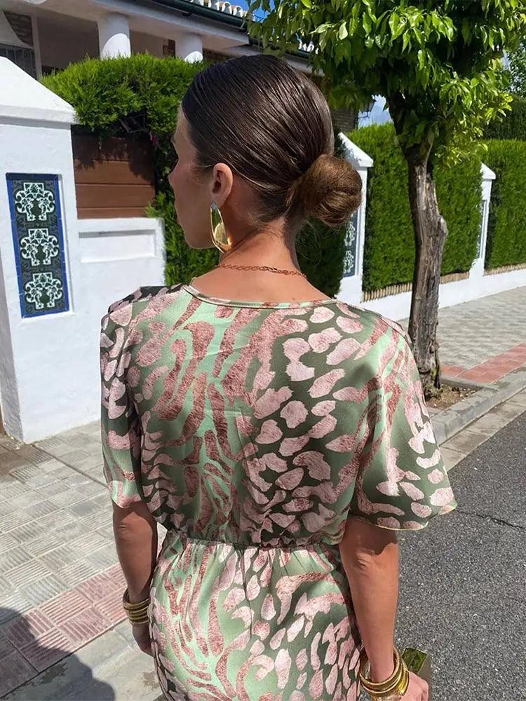 Rückenansicht Florielle – elegantes Damen-Midi-Kleid mit Blumenmuster