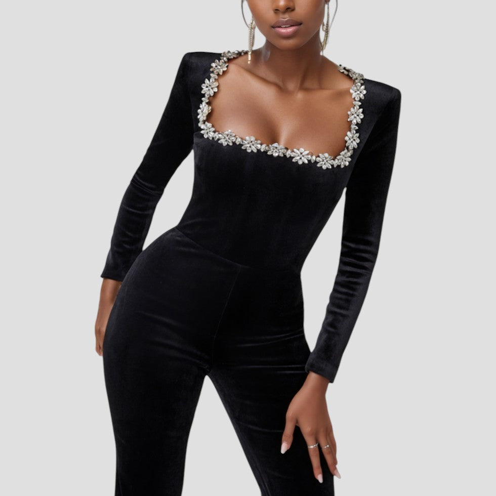 Schwarzer Jumpsuit mit langen Ärmeln und Blumendetail 5