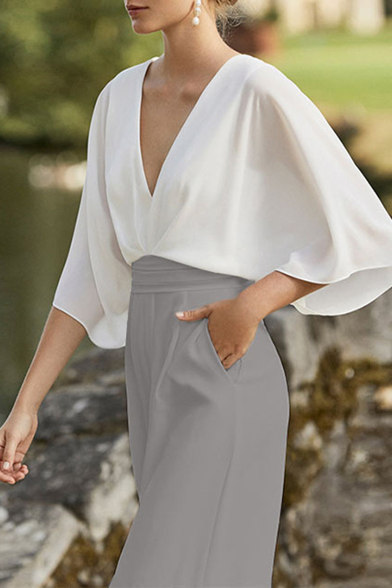 Elegante Jumpsuit mit V-Ausschnitt und Kontrastfarben