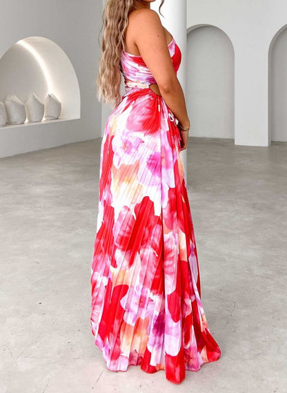 Elegantes Frauenkleid mit Plißen und Blumenmuster