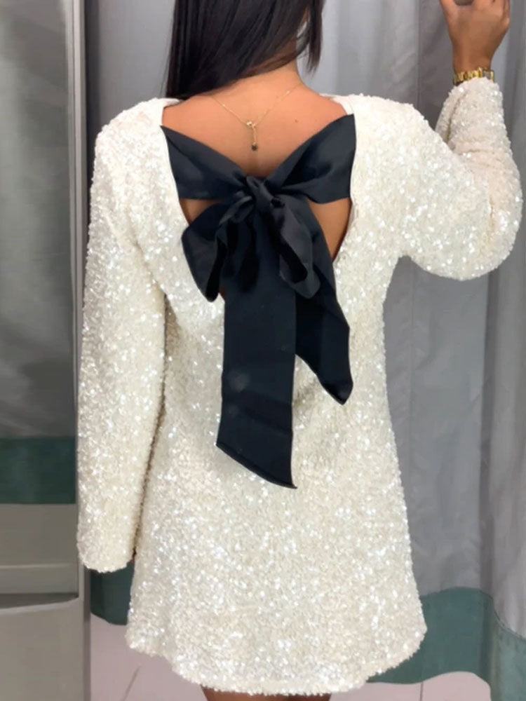 Kleid von Barbara: Pailletten, Schleife am Rücken, Rundhals