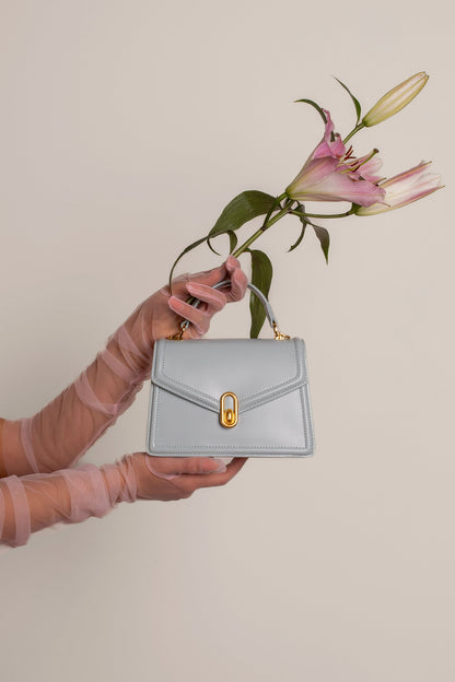 Elegante Damenhandtasche mit Top-Handle und Gold-Verschluss