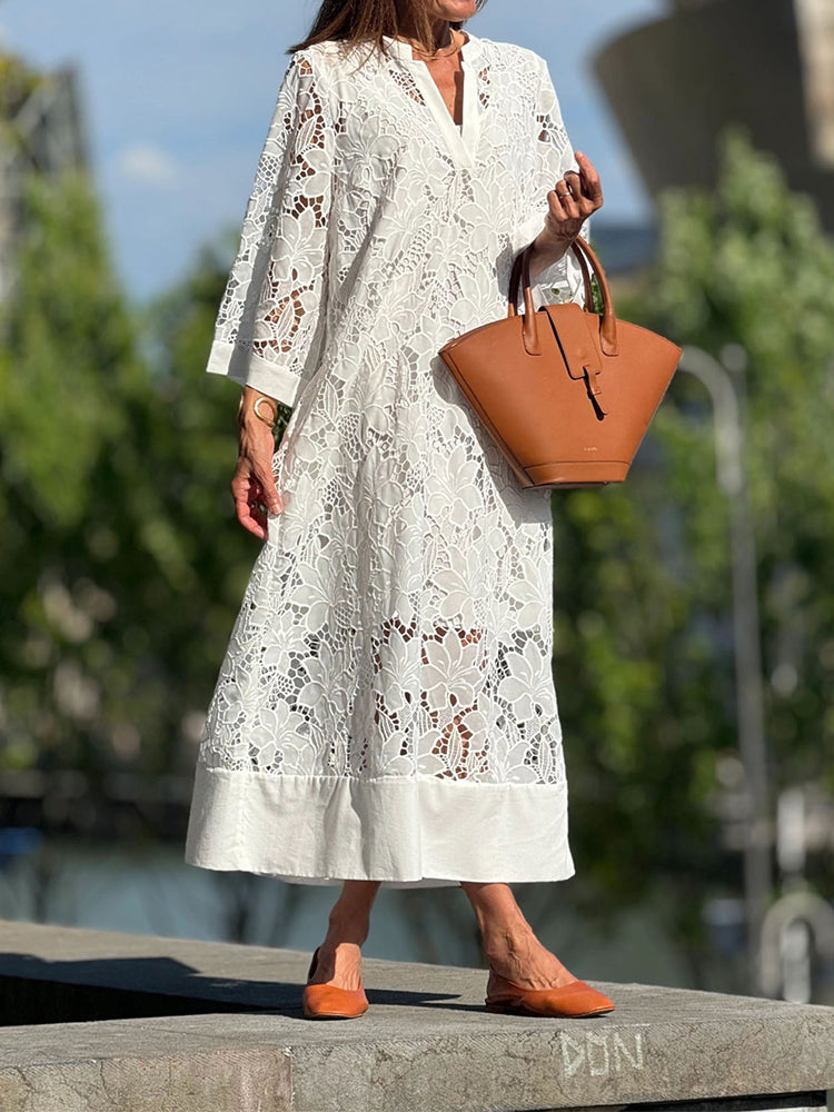 Elegantes Spitzenkleid mit 3/4 Ärmeln und Stehkragen