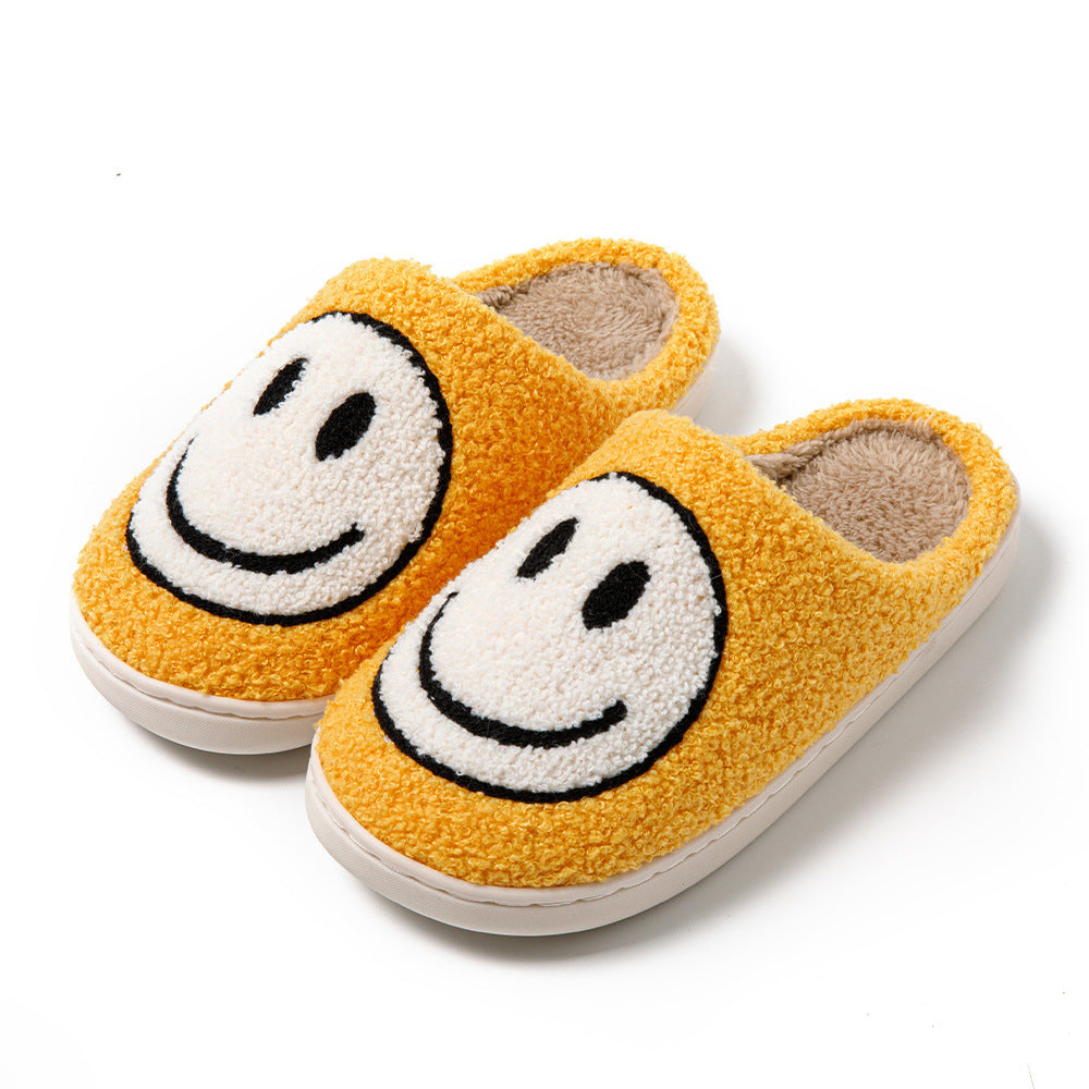 Orange Pelzpantoffel mit weißem Smiley-Design