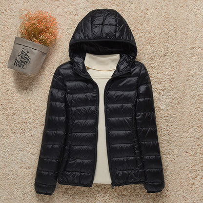 Schwarze Übergangsjacke mit Kapuze
