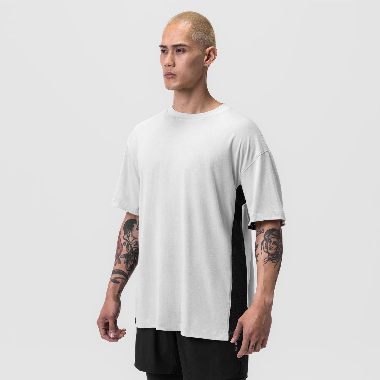 Herren Oversized T-Shirt mit Mesh-Einsätzen Großes Design - BerlinGlamour