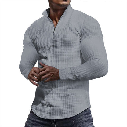 Ein stylisher Langarmshirt mit strukturierter Oberfläche für den modernen Mann. Perfekt für den Alltag, das Fitness-Training oder einfach nur für den Stil. Der Sportliche Langarmshirt ist aus hochwertig