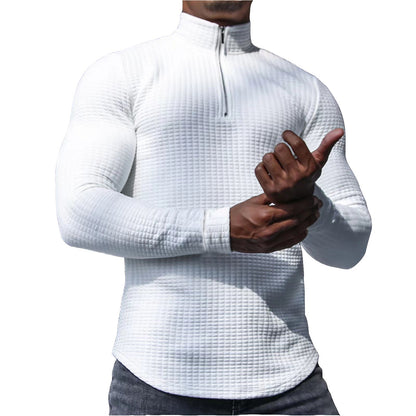 Ein stylisher Langarmshirt mit strukturierter Oberfläche für den modernen Mann. Perfekt für den Alltag, das Fitness-Training oder einfach nur für den Stil. Der Sportliche Langarmshirt ist aus hochwertig