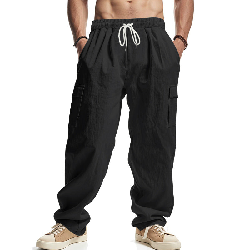 Herren lockere Cargohose mit elastischem Bund und praktischen Seitentaschen. Diese Taschen sind ideal für den täglichen Gebrauch, bieten viel Platz für alle wichtigen Dinge und sind aus robustem Material