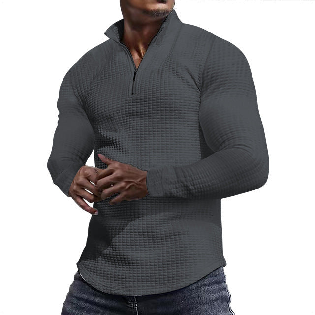 Ein stylisher Langarmshirt mit strukturierter Oberfläche für den modernen Mann. Perfekt für den Alltag, das Fitness-Training oder einfach nur für den Stil. Der Sportliche Langarmshirt ist aus hochwertig