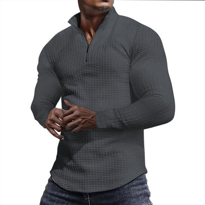 Ein stylisher Langarmshirt mit strukturierter Oberfläche für den modernen Mann. Perfekt für den Alltag, das Fitness-Training oder einfach nur für den Stil. Der Sportliche Langarmshirt ist aus hochwertig