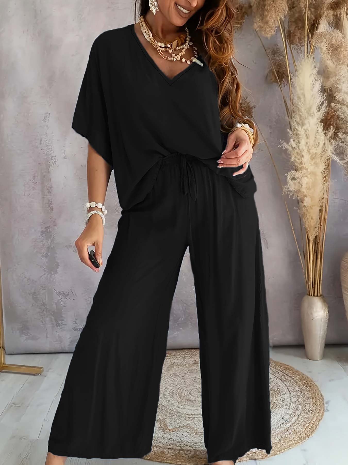 Damen Freizeitoutfit locker Oberteil weite Hosen Casual