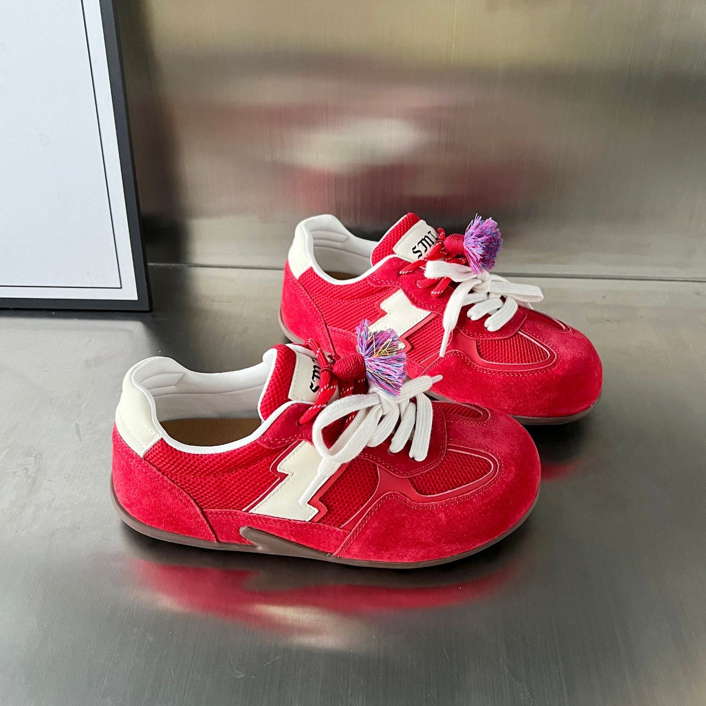 Damen Sneaker Sportlich atmungsaktiv mit Quasten-Details