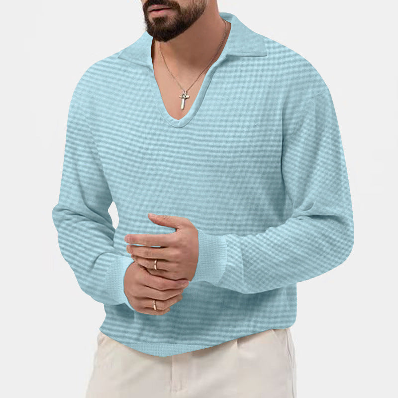 BerlinGlamour ist nicht der passende Begriff. Ich werde nun den Titel ändern und ihn eleganter machen. 

Ein eleganter Herrenpullover mit V-Ausschnitt und strukturiertem Design wäre ein