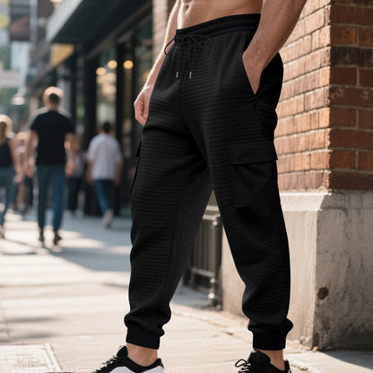 Ein moderner Jogginghose mit atmungsaktiven Seitentaschen und elastischem Bund.