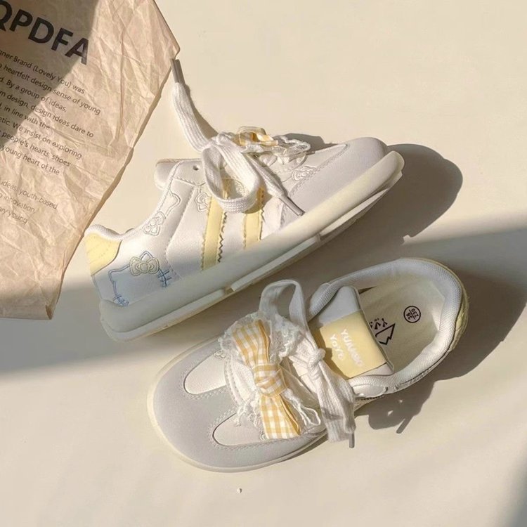 Damen Sneaker mit Rüschen und Blumenmuster