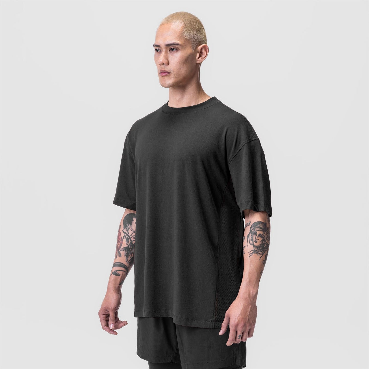 Herren Oversized T-Shirt mit Mesh-Einsätzen Großes Design