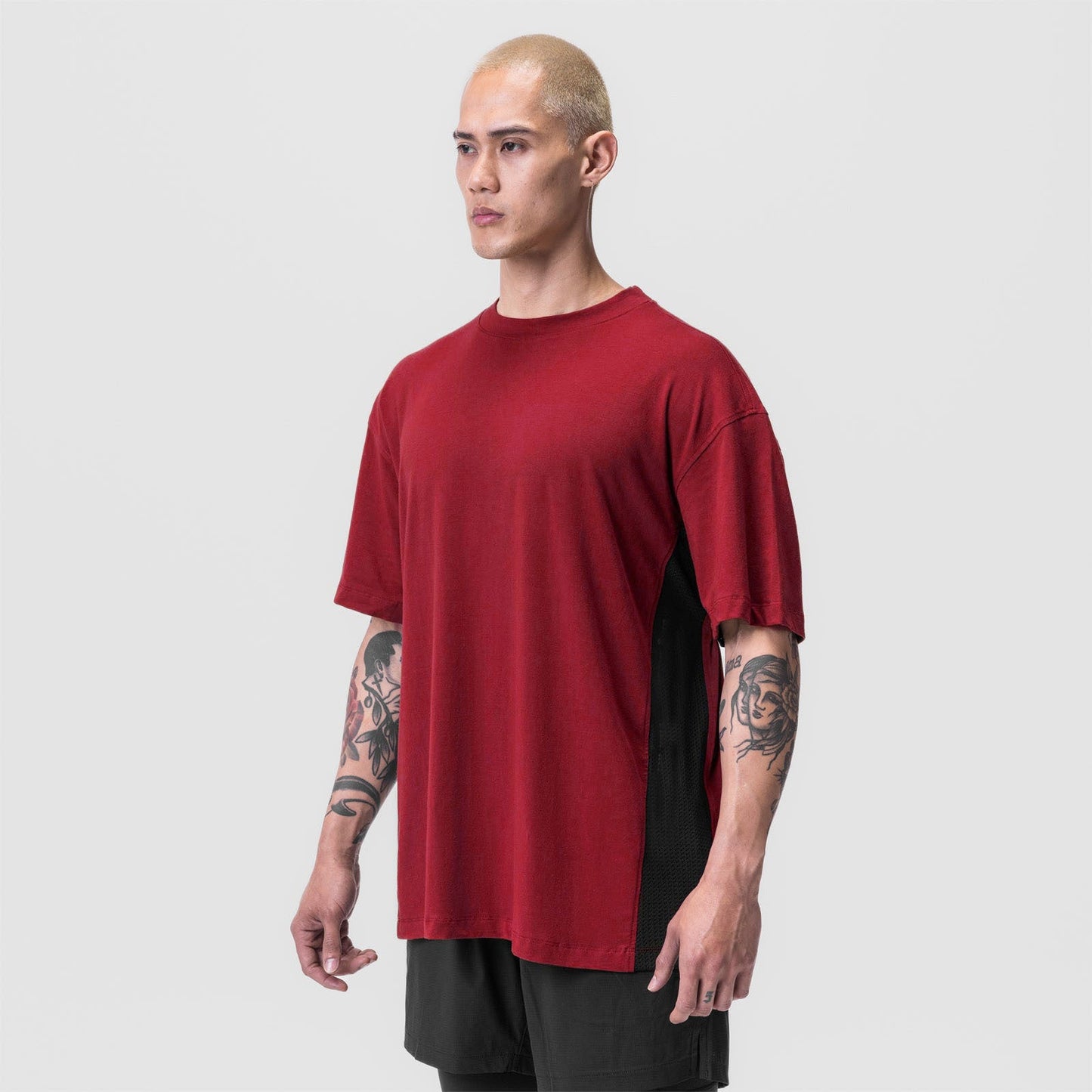 Herren Oversized T-Shirt mit Mesh-Einsätzen Großes Design