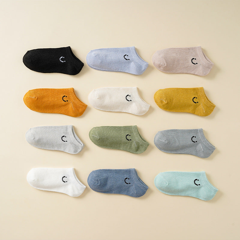 Farbenfrohe Damen Socken mit Smiley Motiv