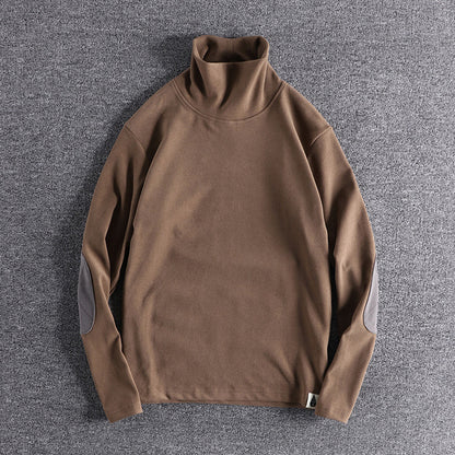 Hochwertige, elegante Stehkragenpullover mit kontrastierenden Ellbogenpatches BerlinGlamour für den anspruchenden Onlineshop.