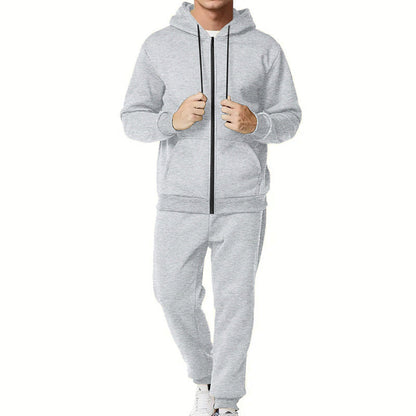 Ein modernes Sportliches Komplett-Set mit Kapuzenjacke und Jogginghose, das für den anspruchsvollen Herren konzipiert ist.
