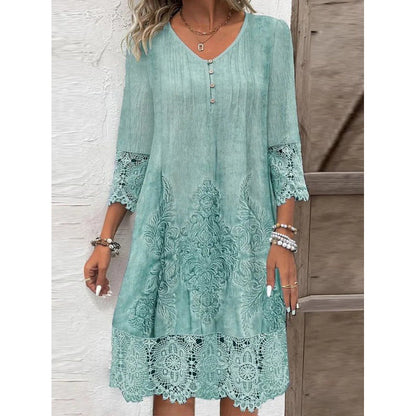 Elegantes Damenkleid mit Spitze und Stickerei