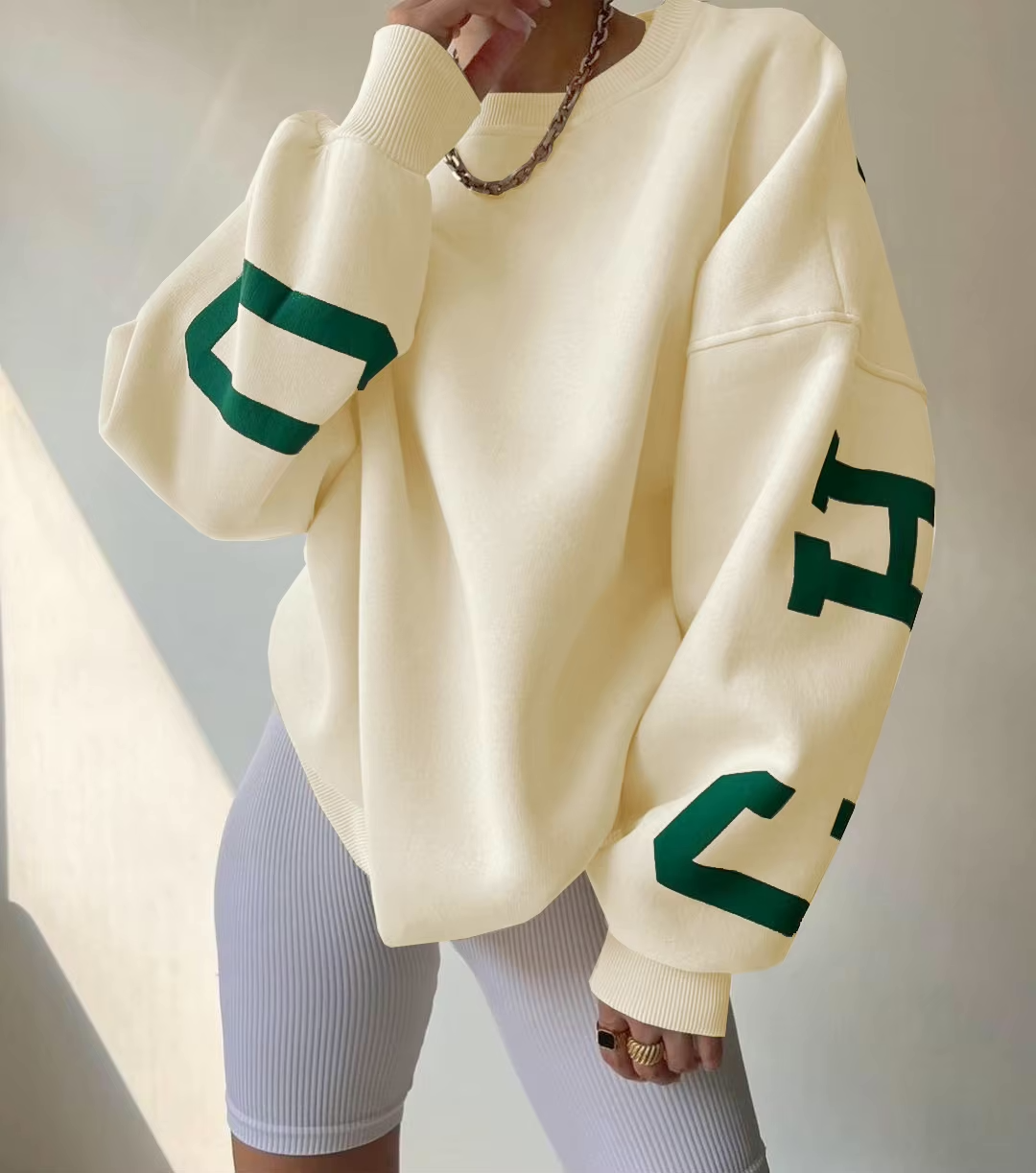 CityPulse Oversized Sweater Damen cremeweiß mit CHICAGO Print
