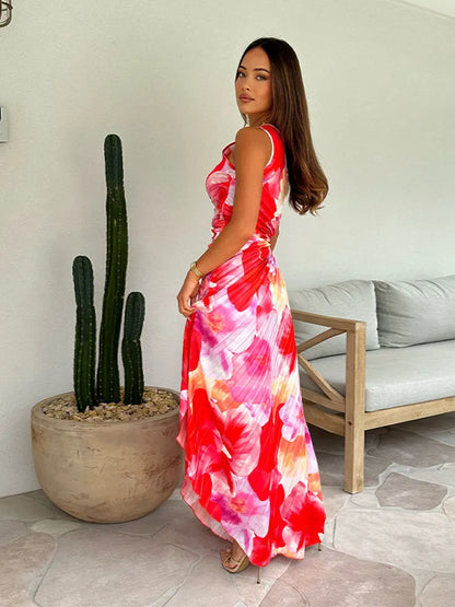 Elegantes Frauenkleid mit Plißen und Blumenmuster