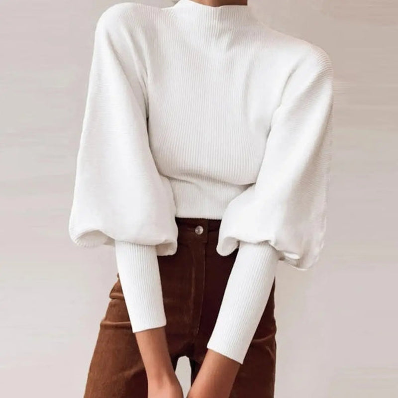 Paulas eleganter Strickpullover: stilvoll für Herbst und Winter