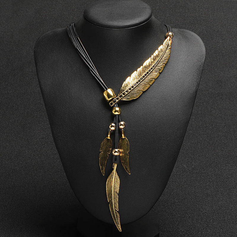 Goldene Halskette Boho Feder Schmuck - BerlinGlamour