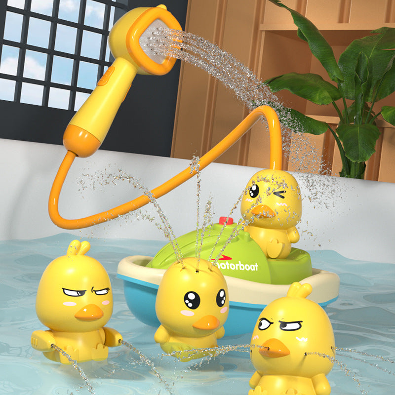 Babybadente Wasserspielzeug Ente mit Spritzfunktion - BerlinGlamour