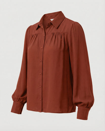 Elegante Damenbluse mit Volumenärmeln und Rüschen