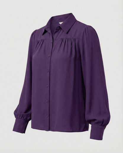 Elegante Damenbluse mit Volumenärmeln und Rüschen
