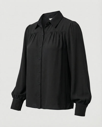 Elegante Damenbluse mit Volumenärmeln und Rüschen